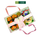 Hộp Quà Trái Cây Táo, Nho, kiwi, quýt úc với nơ hồng trang trí