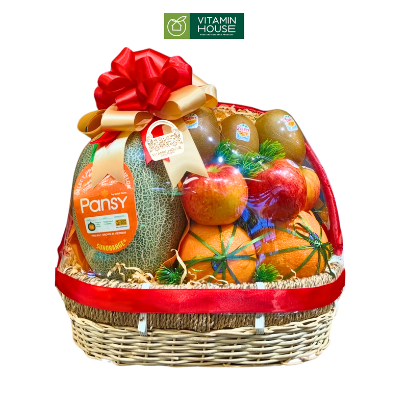 giỏ quà trái cây nhập khẩu tặng bác bao gồm dưa lưới, cam vàng mỹ, kiwi new zealand và táo envy