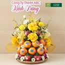 giỏ trái cây nhập khẩu dâng lễ quýt, táo và hoa tươi
