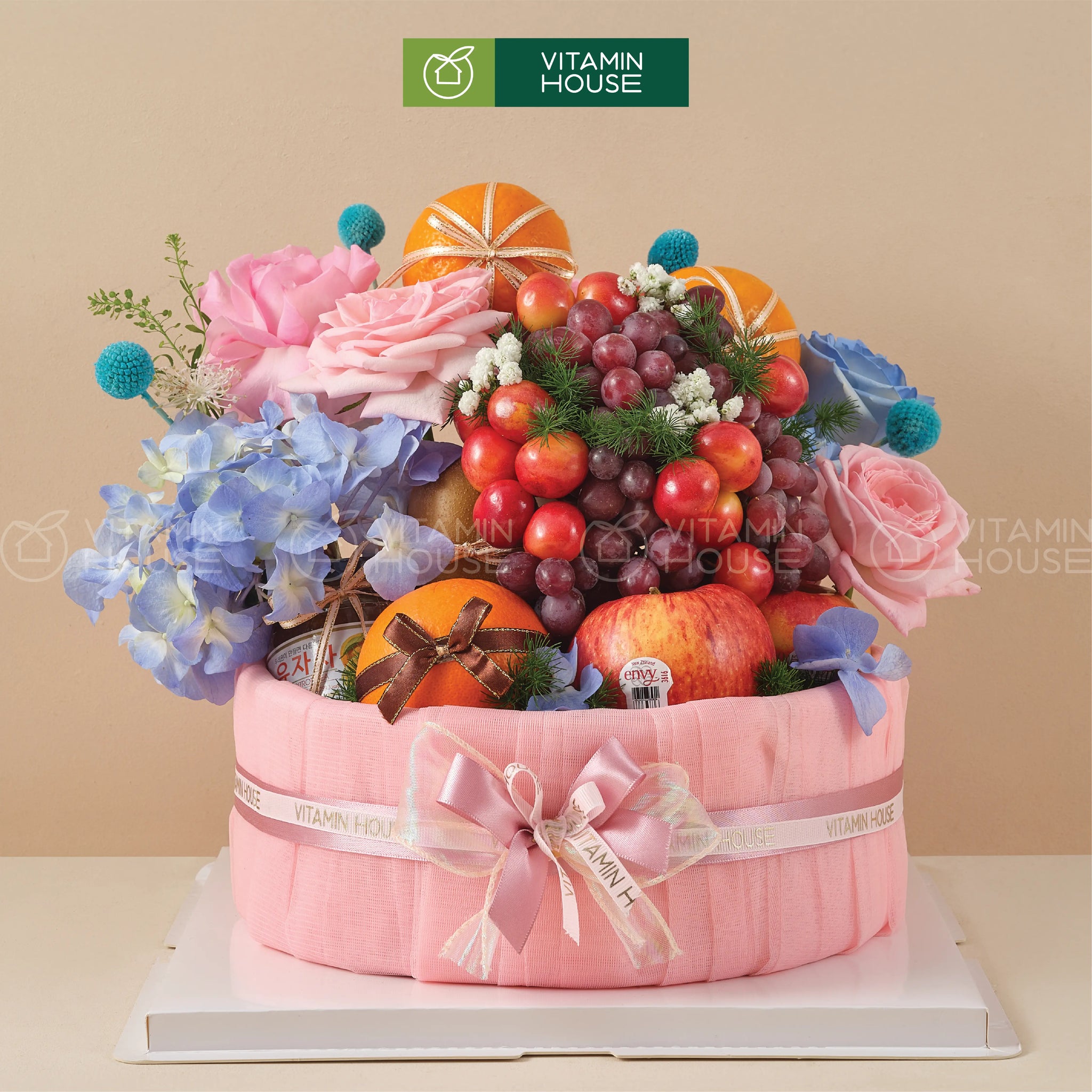 giỏ trái cây màu hồng pastel ngọt ngào mix hoa tươi nhã nhặn tặng phái đẹp