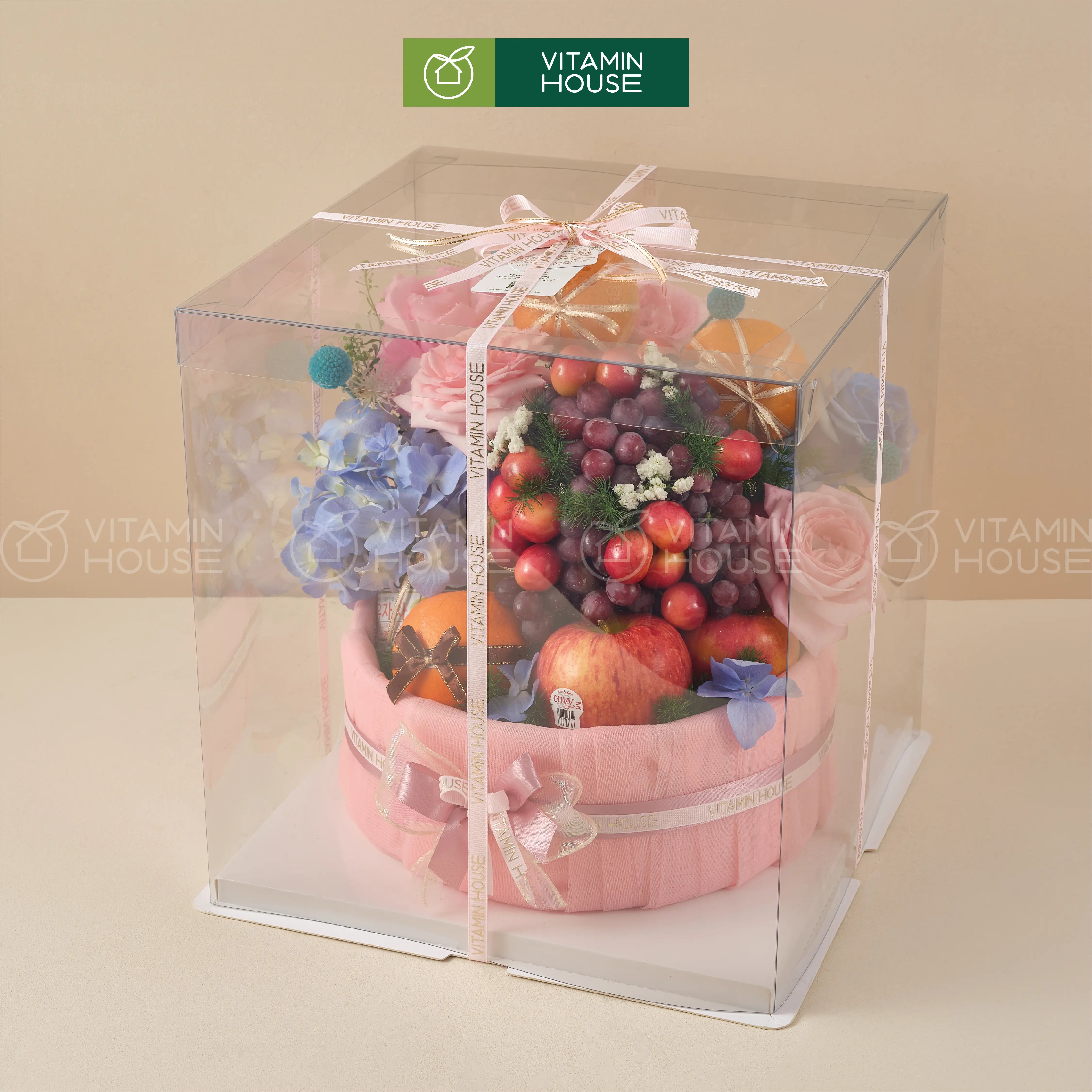 Giỏ trái cây màu hồng pastel ngọt ngào mix hoa tươi nhã nhặn tặng phái đẹp