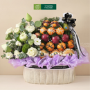 giỏ trái cây kính viếng gồm sen trắng kết hợp cùng lê, quýt, táo đỏ và giỏ bắn lưới tông tím đen và nơ đen 2