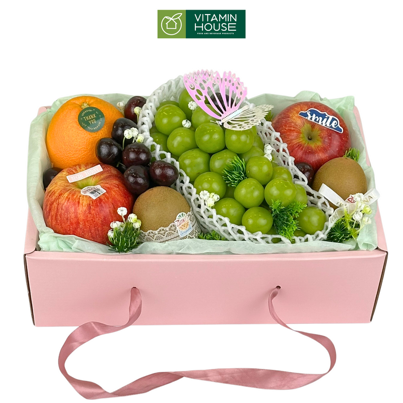 hộp quà trái cây màu hồng nho xanh, cherry, táo envy, cam và kiwi vàng