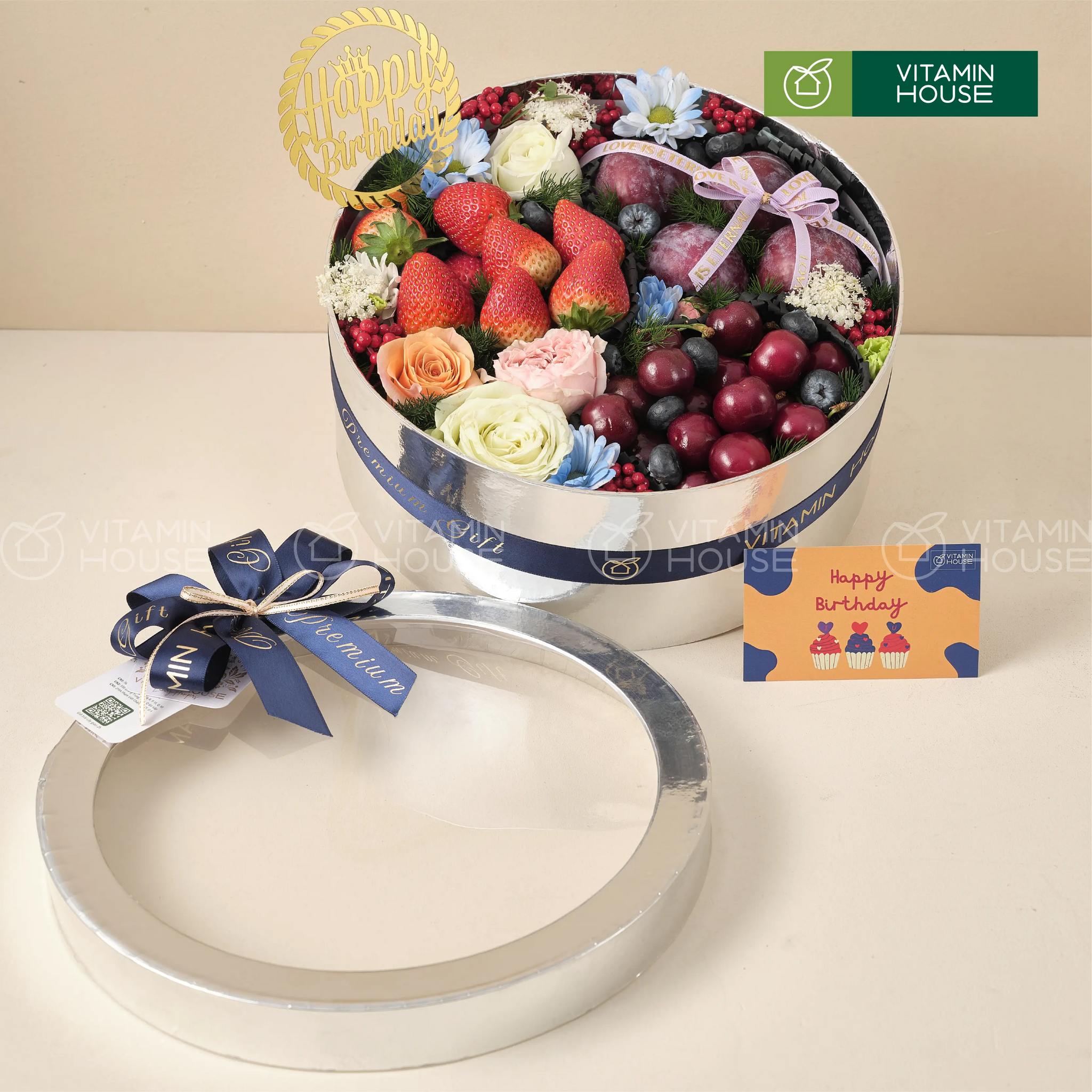 hộp quà trái cây cherry, dâu tây, việt quất và hoa tươi hình tròn màu bạc sang trọng